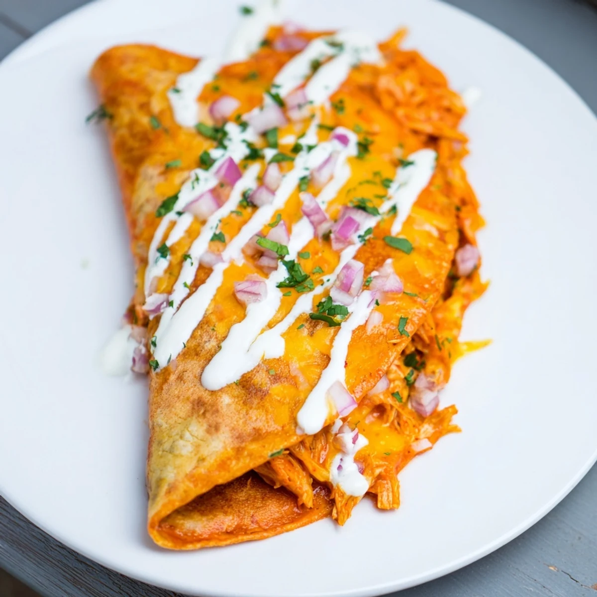 Golden, bubbly Buffalo Chicken Quesadilla, filled with spicy chicken, melted cheese, ready to be devoured.
