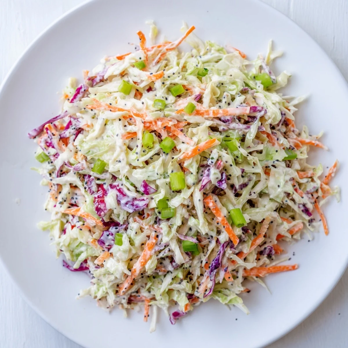 A colorful bowl of creamy Quick Coleslaw Salad, ready to enhance any barbecue meal.