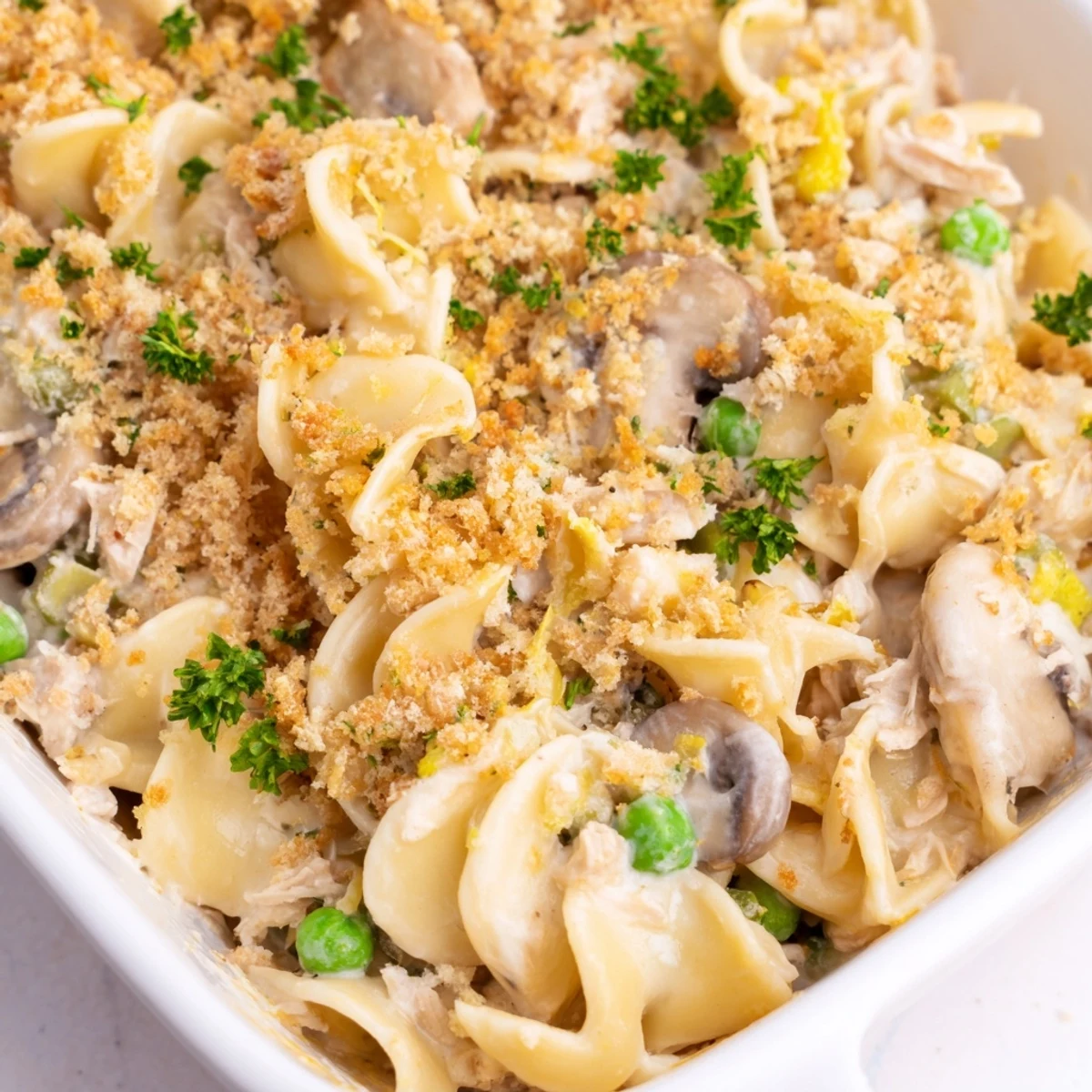 Hearty Tuna Noodle Casserole with visible vegetables, perfect for a cozy weeknight dinner.