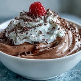 Decadent cottage cheese chocolate mousse, creamy texture perfect with fresh berries.
