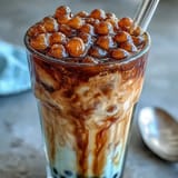 Homemade Brown Sugar Boba Milk Tea featuring rich tea and soft tapioca pearls.