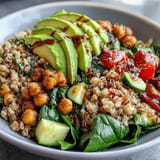 Hearty Ancient Grains Bowl, vibrant with chickpeas, vegetables, and a lemony dressing.