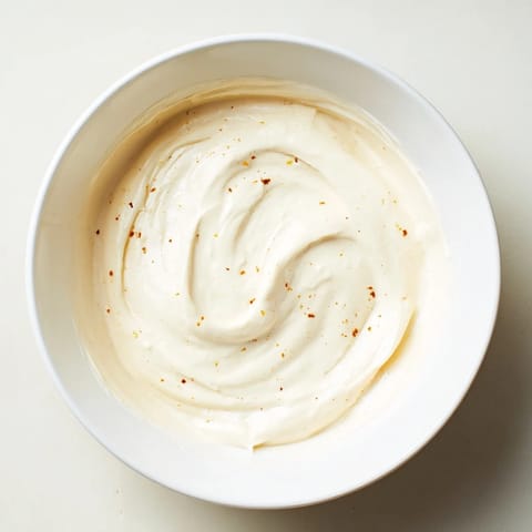 Fresh strawberries and melon alongside this easy Greek Yogurt Fruit Dip for a healthy snack.