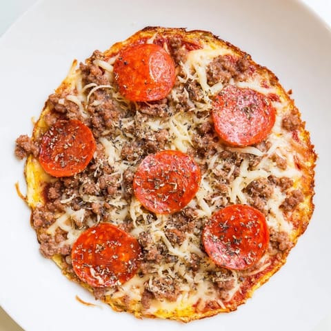 Golden, bubbly Meat Pizza Pepperoni Stack with savory beef, herbs, and spicy pepperoni, ready to eat.