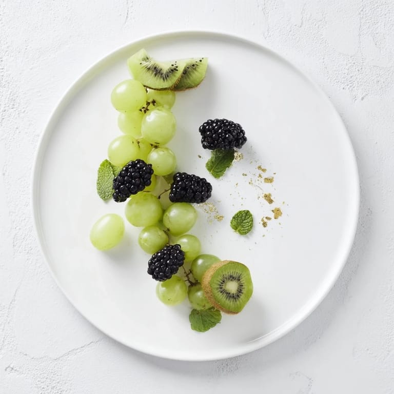 Imagine juicy blackberries, grapes, and kiwi, forming a beautiful The Aurora Borealis Sweep fruit centerpiece.
